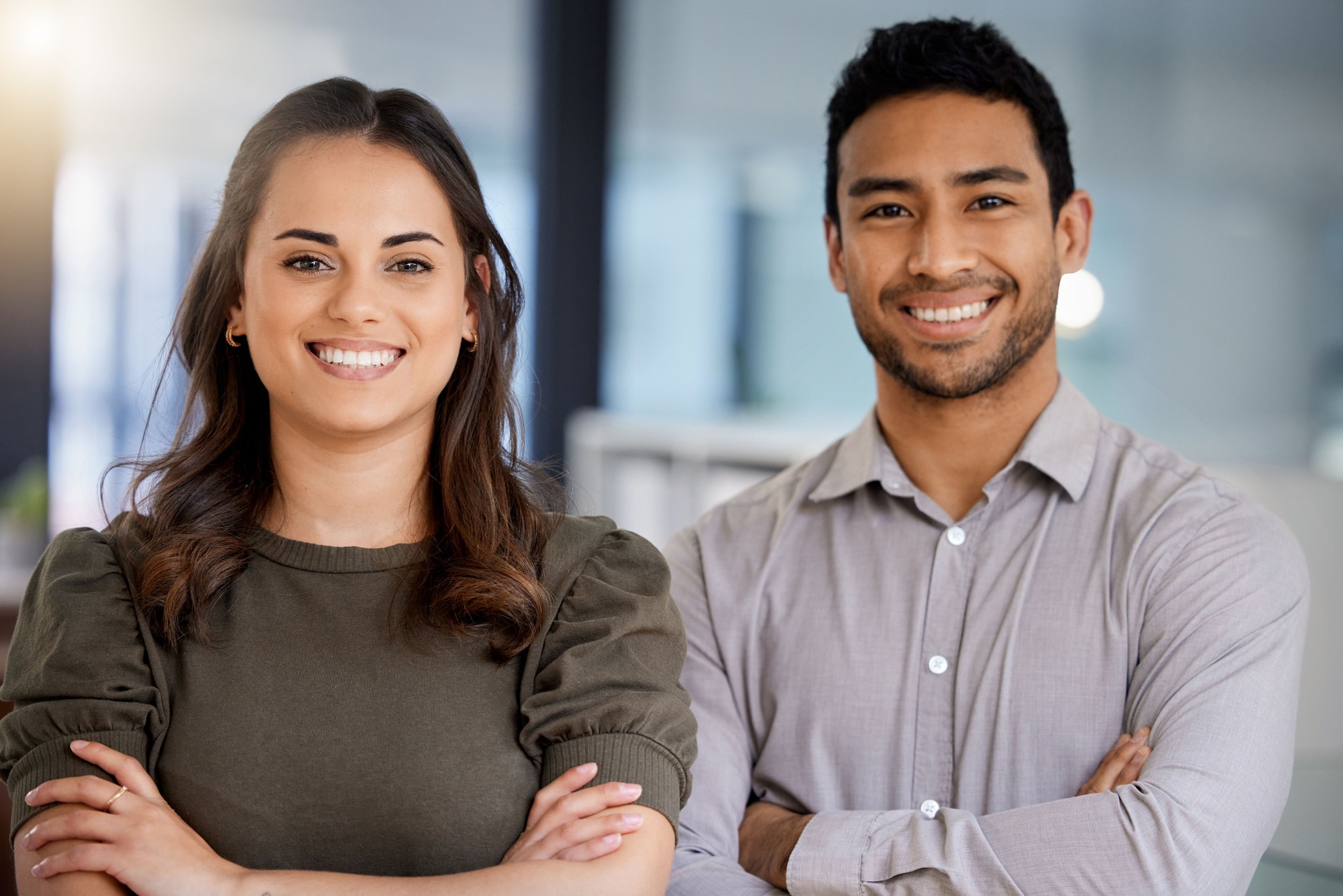 Portrait of two young businesspeople at work in a modern office