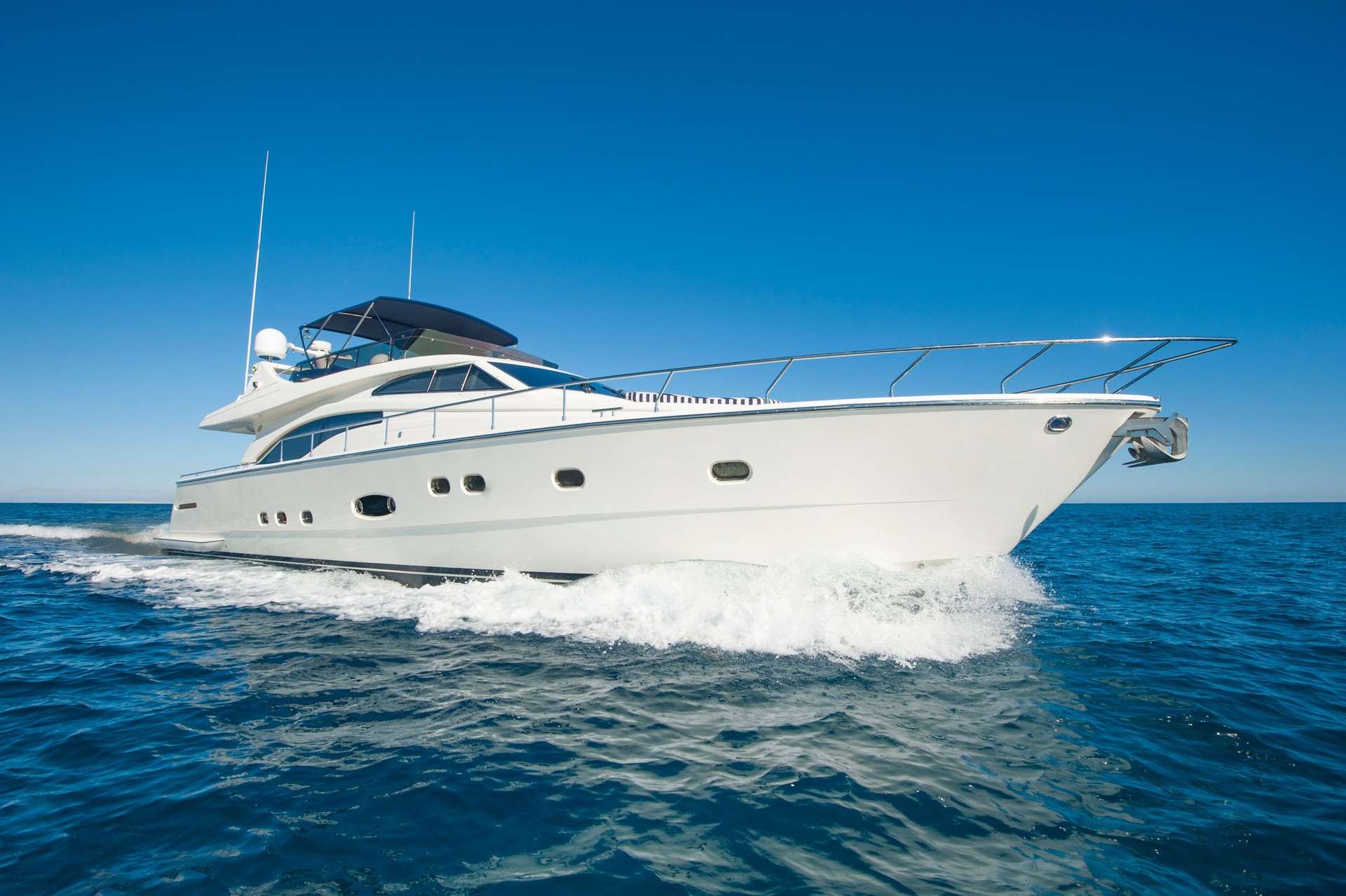 Luxury private motor yacht sailing at sea